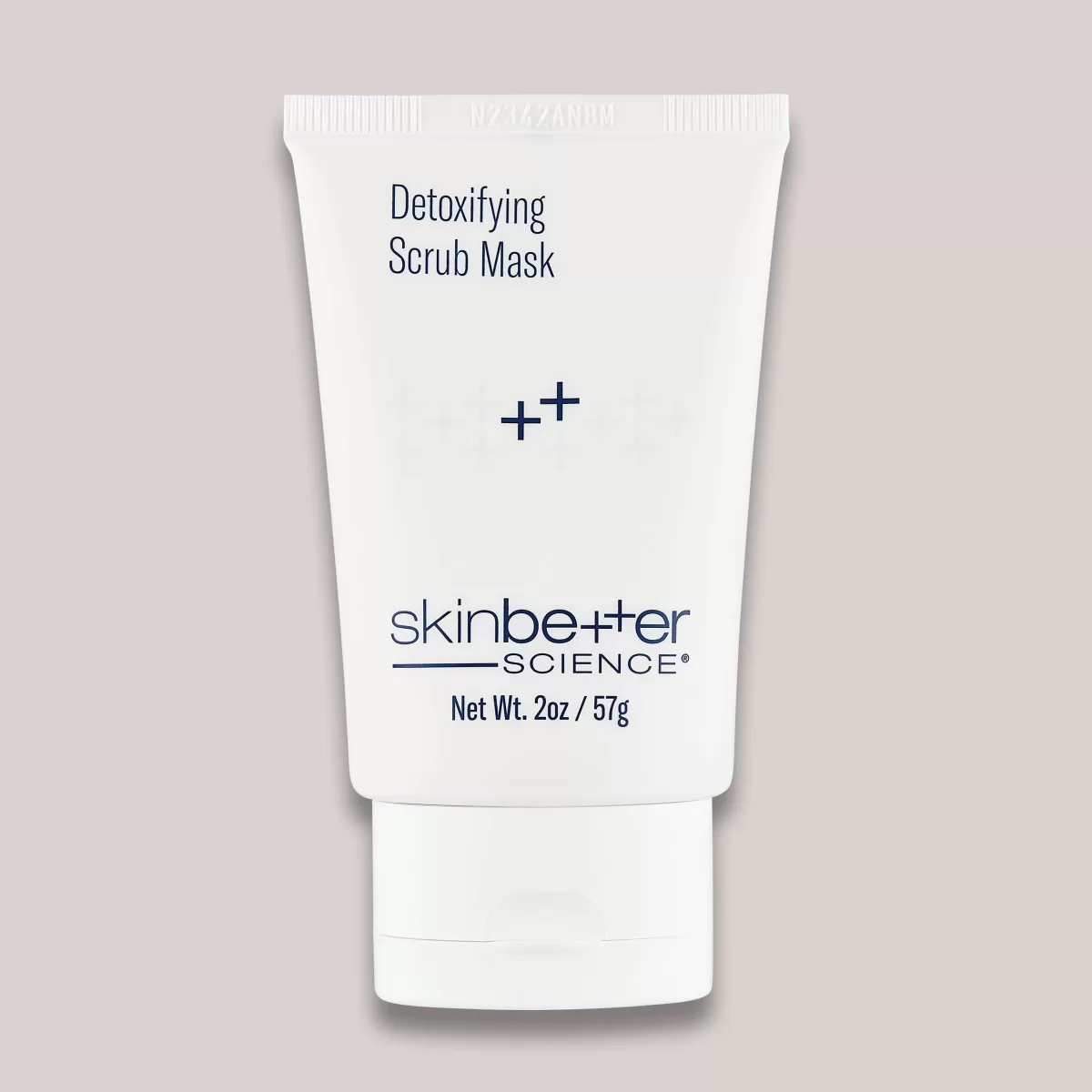 A high-resolution image of the Detoxifying Scrub Mask, 2 oz, highlighting the product’s sleek packaging and its deep-cleansing formula designed to detoxify the skin, remove impurities, and provide gentle exfoliation for a refreshed complexion.