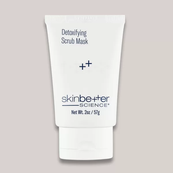A high-resolution image of the Detoxifying Scrub Mask, 2 oz, highlighting the product’s sleek packaging and its deep-cleansing formula designed to detoxify the skin, remove impurities, and provide gentle exfoliation for a refreshed complexion.