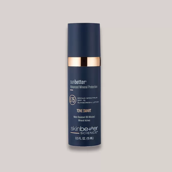 A high-resolution image of the sunbetter TONE SMART SPF 75 Sunscreen Lotion, Travel Size (15 ml), highlighting the travel-friendly packaging and tone-adapting formula that offers SPF 75 sun protection while evening out skin tone for a flawless complexion.